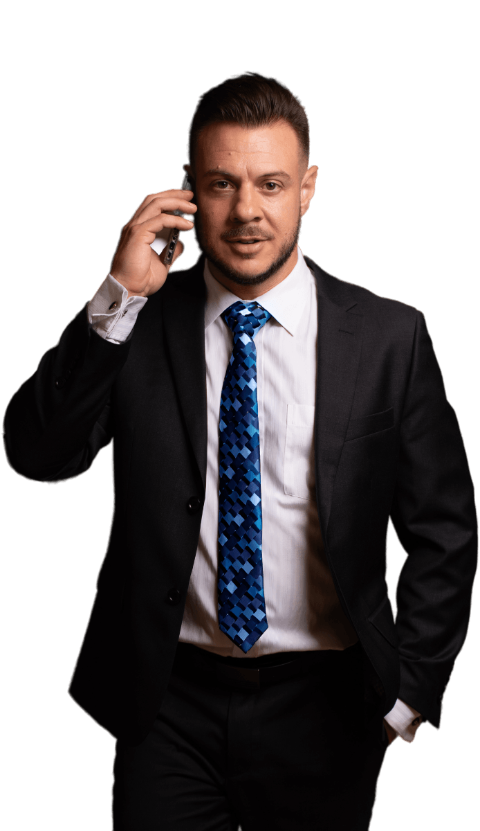 Orange County Truck Accident Lawyer Joseph Gallo on the phone fighting for his client